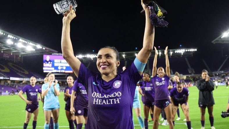 Mar 22, 2024; Orlando, Florida, USA;  Orlando Pride forward Marta (10) celebrates after second half against Angel City FC at Inter&Co Stadium. Mandatory Credit: Nathan Ray Seebeck-USA TODAY Sports