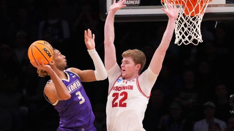 Mar 22, 2024; Brooklyn, NY, USA; James Madison Dukes forward T.J. Bickerstaff (3) shoots the ball over Wisconsin Badgers forward Steven Crowl (22) in the first round of the 2024 NCAA Tournament at the Barclays Center.  Mandatory Credit: Robert Deutsch-USA TODAY Sports