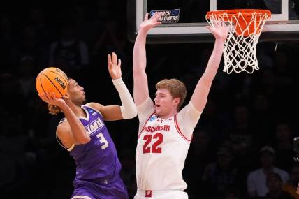 Mar 22, 2024; Brooklyn, NY, USA; James Madison Dukes forward T.J. Bickerstaff (3) shoots the ball over Wisconsin Badgers forward Steven Crowl (22) in the first round of the 2024 NCAA Tournament at the Barclays Center.  Mandatory Credit: Robert Deutsch-USA TODAY Sports
