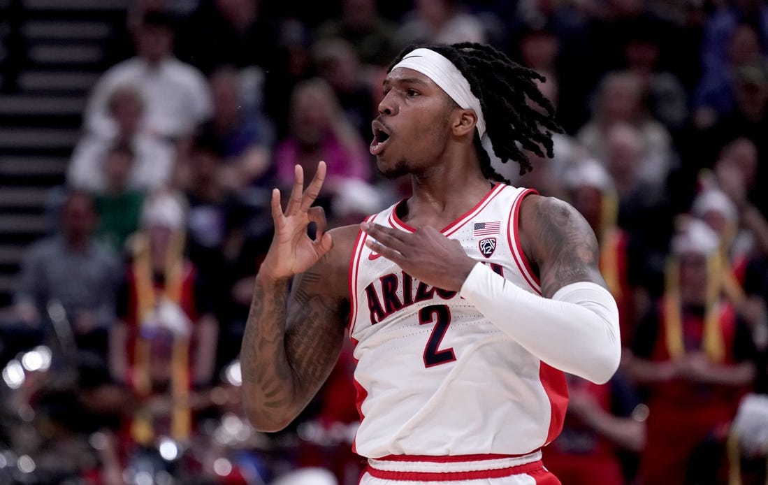 Mar 23, 2024; Salt Lake City, UT, USA; Arizona Wildcats guard Caleb Love (2) reacts after a basket during the first half in the second round of the 2024 NCAA Tournament against the Dayton Flyers at Vivint Smart Home Arena-Delta Center. Mandatory Credit: Gabriel Mayberry-USA TODAY Sports