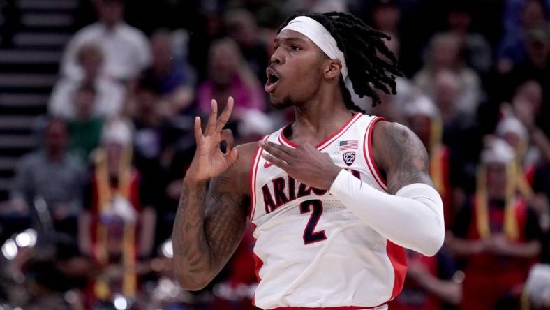 Mar 23, 2024; Salt Lake City, UT, USA; Arizona Wildcats guard Caleb Love (2) reacts after a basket during the first half in the second round of the 2024 NCAA Tournament against the Dayton Flyers at Vivint Smart Home Arena-Delta Center. Mandatory Credit: Gabriel Mayberry-USA TODAY Sports