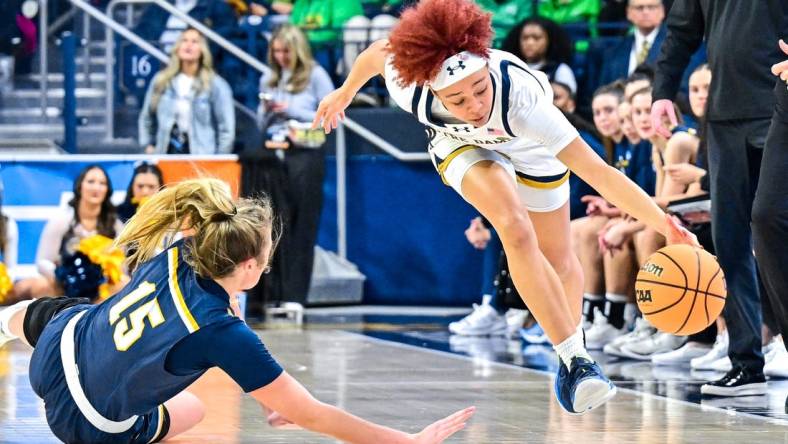 Mar 23, 2024; South Bend, Indiana, USA; Notre Dame Fighting Irish guard Hannah Hidalgo (3) steals the ball from Kent State Golden Flashes forward Bridget Dunn (15) in the second half at the Purcell Pavilion. Mandatory Credit: Matt Cashore-USA TODAY Sports