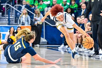 Mar 23, 2024; South Bend, Indiana, USA; Notre Dame Fighting Irish guard Hannah Hidalgo (3) steals the ball from Kent State Golden Flashes forward Bridget Dunn (15) in the second half at the Purcell Pavilion. Mandatory Credit: Matt Cashore-USA TODAY Sports