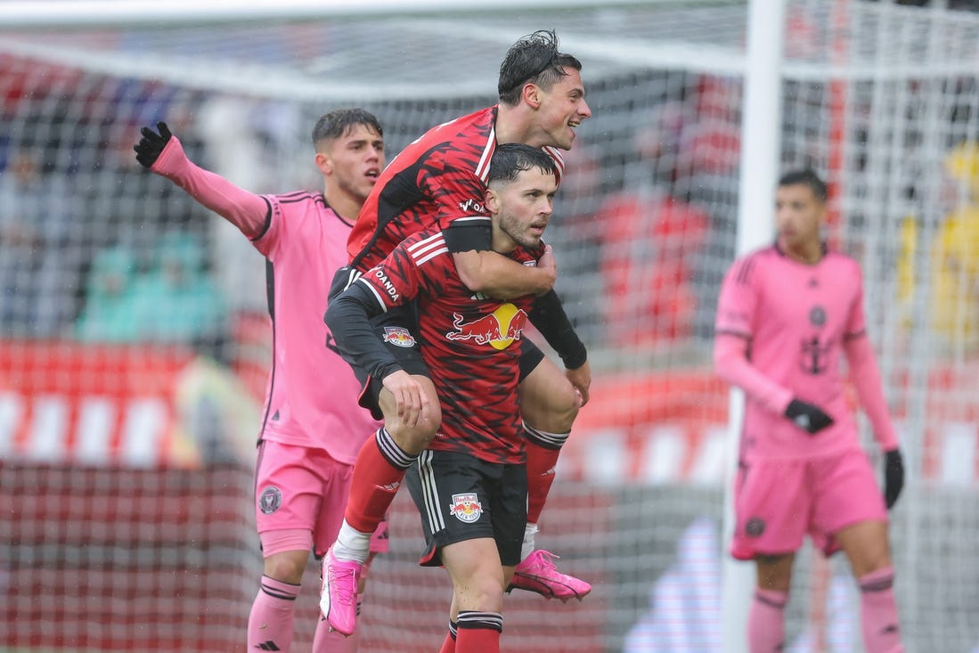 Mar 23, 2024; Harrison, New Jersey, USA; New York Red Bulls midfielder Lewis Morgan (9) celebrates his goal with forward Dante Vanzeir (13) in the second half against Inter Miami CF at Red Bull Arena. Mandatory Credit: Brad Penner-USA TODAY Sports