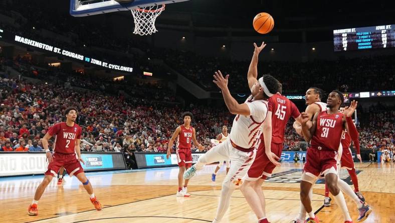 Iowa State Cyclones guard Tamin Lipsey (3) shoots the ball in a second-round NCAA Tournament game between Iowa State and Washington State, Saturday, March 23, 2024 at CHI Health Center Arena in Omaha.