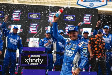 Kyle Larson (17) celebrates winning the NASCAR Xfinity Series Focus Health 250 at the Circuit of the Americas on Saturday, March 23, 2024 in Austin.