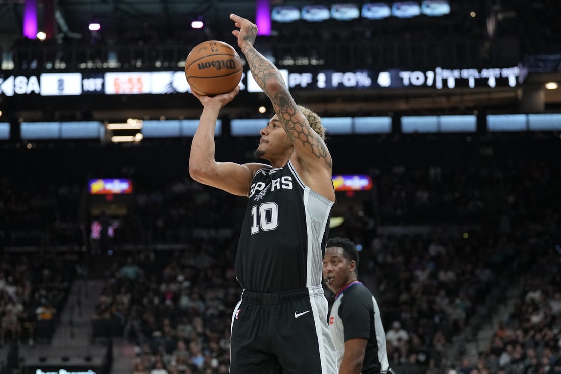 Mar 23, 2024; San Antonio, Texas, USA;  San Antonio Spurs forward Jeremy Sochan (10) shoots in the first half against the Phoenix Suns at Frost Bank Center. Mandatory Credit: Daniel Dunn-USA TODAY Sports