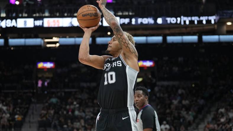 Mar 23, 2024; San Antonio, Texas, USA;  San Antonio Spurs forward Jeremy Sochan (10) shoots in the first half against the Phoenix Suns at Frost Bank Center. Mandatory Credit: Daniel Dunn-USA TODAY Sports