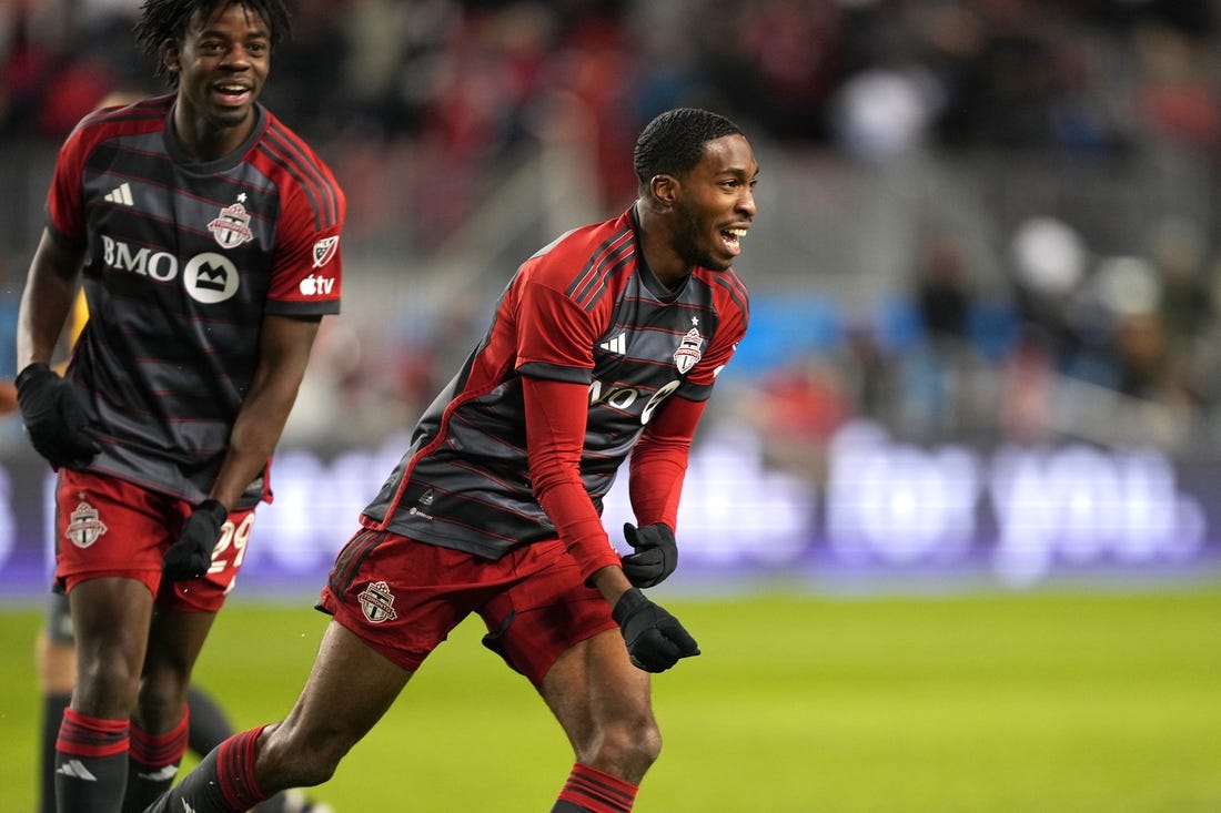 Mar 23, 2024; Toronto, Ontario, USA; Toronto FC forward Tyrese Spicer (16) celebrates his goal against Atlanta United at BMO Field. Mandatory Credit: Nick Turchiaro-USA TODAY Sports