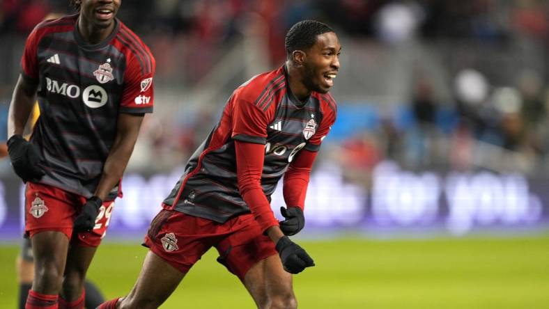 Mar 23, 2024; Toronto, Ontario, USA; Toronto FC forward Tyrese Spicer (16) celebrates his goal against Atlanta United at BMO Field. Mandatory Credit: Nick Turchiaro-USA TODAY Sports