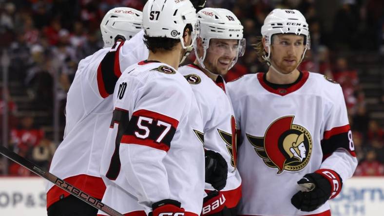 Mar 23, 2024; Newark, New Jersey, USA; Ottawa Senators right wing Drake Batherson (19) celebrates his goal against the New Jersey Devils during the third period at Prudential Center. Mandatory Credit: Ed Mulholland-USA TODAY Sports