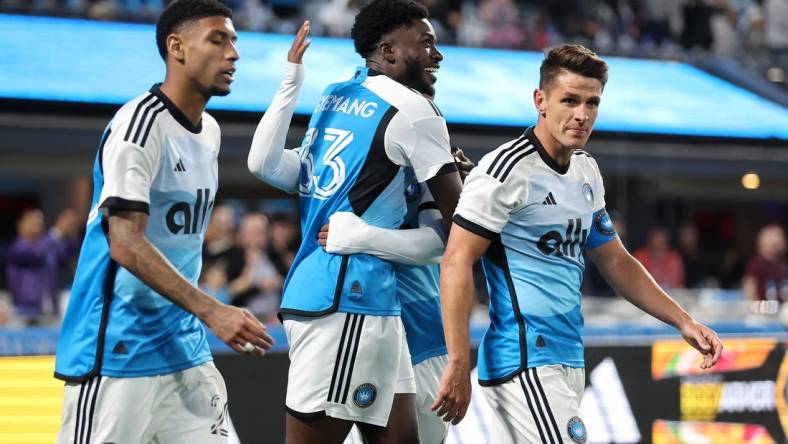 Mar 23, 2024; Charlotte, North Carolina, USA; Charlotte FC forward Patrick Agyemang (33) reacts after scoring a goal against the Columbus Crew in the second half at Bank of America Stadium. Mandatory Credit: Cory Knowlton-USA TODAY Sports