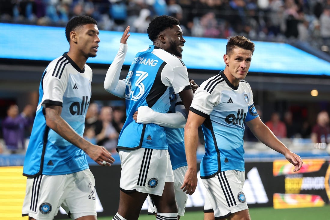 Mar 23, 2024; Charlotte, North Carolina, USA; Charlotte FC forward Patrick Agyemang (33) reacts after scoring a goal against the Columbus Crew in the second half at Bank of America Stadium. Mandatory Credit: Cory Knowlton-USA TODAY Sports