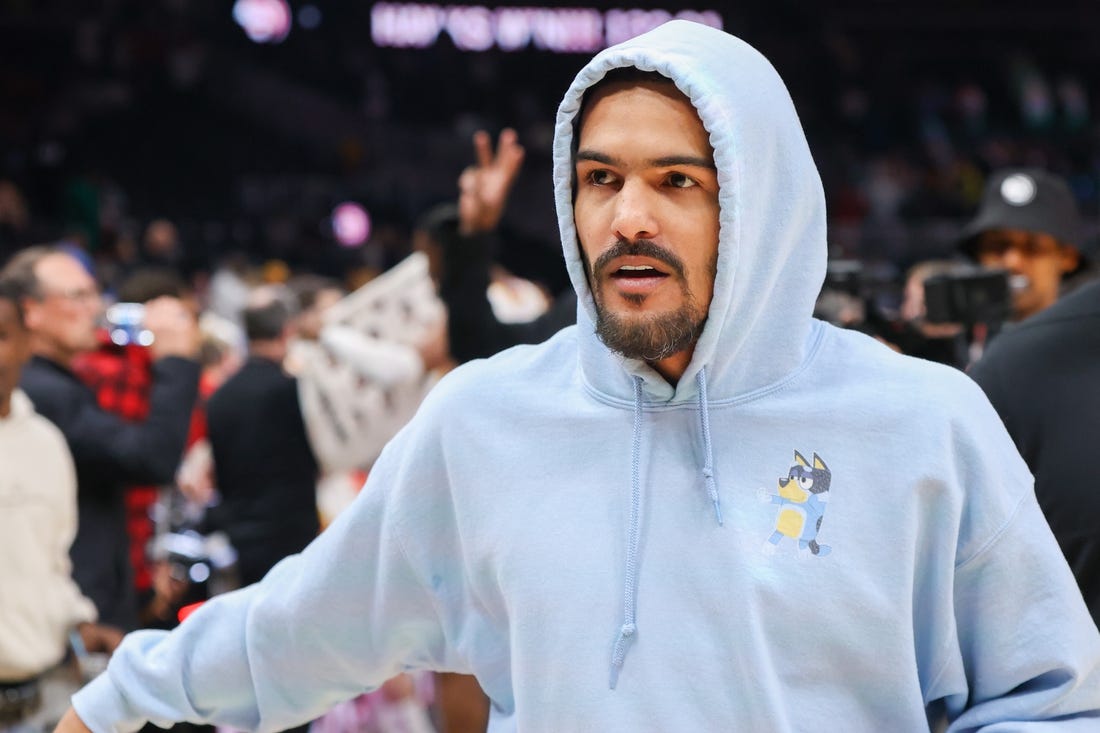 Mar 23, 2024; Atlanta, Georgia, USA; Atlanta Hawks guard Trae Young (11) walks off the court after a game against the Charlotte Hornets at State Farm Arena. Mandatory Credit: Brett Davis-USA TODAY Sports