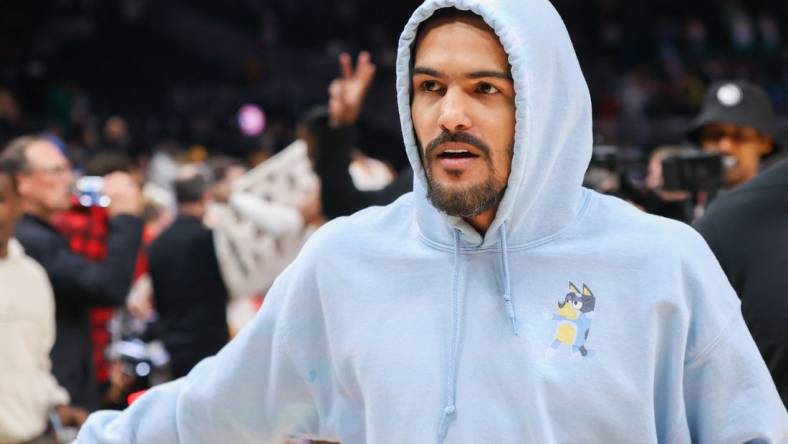 Mar 23, 2024; Atlanta, Georgia, USA; Atlanta Hawks guard Trae Young (11) walks off the court after a game against the Charlotte Hornets at State Farm Arena. Mandatory Credit: Brett Davis-USA TODAY Sports