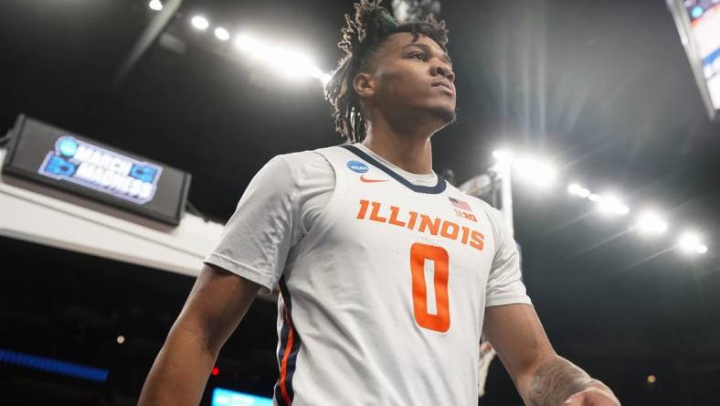 Mar 23, 2024; Omaha, NE, USA; Illinois Fighting Illini guard Terrence Shannon Jr. (0) looks on against the Duquesne Dukes during the second half in the second round of the 2024 NCAA Tournament at CHI Health Center Omaha. Mandatory Credit: Dylan Widger-USA TODAY Sports