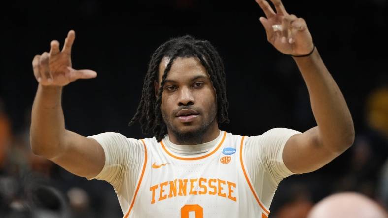 March 23, 2024, Charlotte, NC, USA;  Tennessee Volunteers forward Jonas Aidoo (0) celebrates defeating the Texas Longhorns in the second round of the 2024 NCAA Tournament at the Spectrum Center. Mandatory Credit: Bob Donnan-USA TODAY Sports