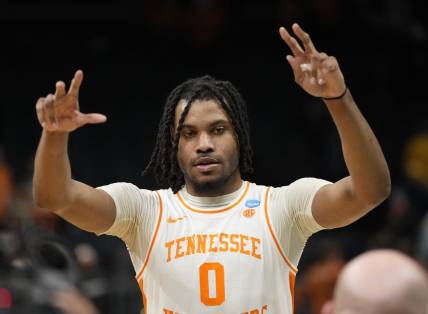 March 23, 2024, Charlotte, NC, USA;  Tennessee Volunteers forward Jonas Aidoo (0) celebrates defeating the Texas Longhorns in the second round of the 2024 NCAA Tournament at the Spectrum Center. Mandatory Credit: Bob Donnan-USA TODAY Sports