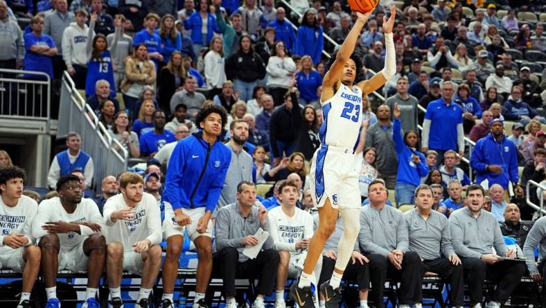 Mar 23, 2024; Pittsburgh, PA, USA; Creighton Bluejays guard Trey Alexander (23) shoots the ball during the second half of the game against the Oregon Ducks in the second round of the 2024 NCAA Tournament at PPG Paints Arena. Mandatory Credit: Gregory Fisher-USA TODAY Sports