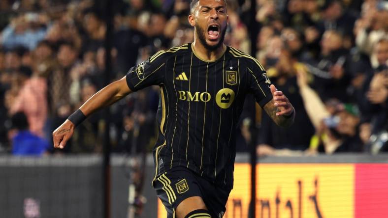 Mar 23, 2024; Los Angeles, California, USA; LAFC forward Denis Bouanga (99) celebrates his goal against Nashville SC during the first half at BMO Stadium. Mandatory Credit: Kiyoshi Mio-USA TODAY Sports