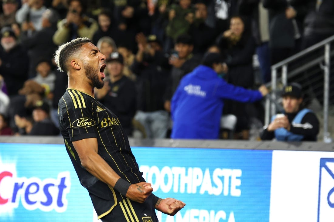 Mar 23, 2024; Los Angeles, California, USA; LAFC forward Denis Bouanga (99) celebrates his goal against Nashville SC during the first half at BMO Stadium. Mandatory Credit: Kiyoshi Mio-USA TODAY Sports