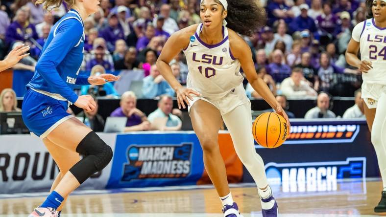 Angel Reese 10 drives to the basket as The LSU Tigers take on the Middle Tennessee Blue Raiders in the second round of the 2024 NCAA Tournament in Baton Rouge, LA at the Pete Maravich Assembly Center. Sunday, March 24, 2024.