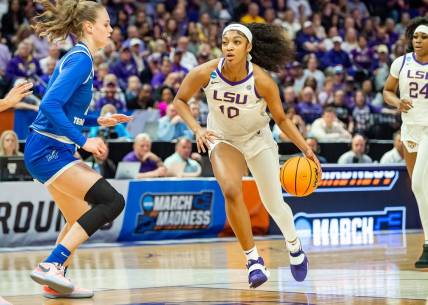 Angel Reese 10 drives to the basket as The LSU Tigers take on the Middle Tennessee Blue Raiders in the second round of the 2024 NCAA Tournament in Baton Rouge, LA at the Pete Maravich Assembly Center. Sunday, March 24, 2024.