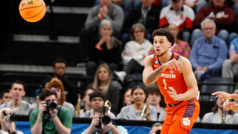 Clemson's Chase Hunter (1) passes the ball during the second round game between Clemson University and Baylor University in the 2024 NCAA Tournament at FedExForum in Memphis, Tenn., on Sunday, March 24, 2024.