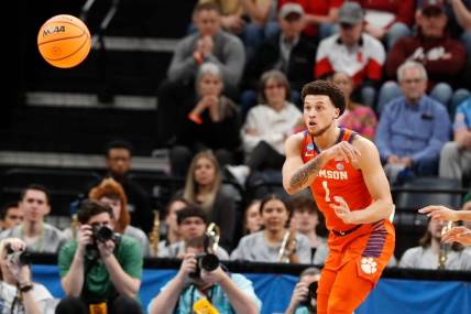 Clemson's Chase Hunter (1) passes the ball during the second round game between Clemson University and Baylor University in the 2024 NCAA Tournament at FedExForum in Memphis, Tenn., on Sunday, March 24, 2024.