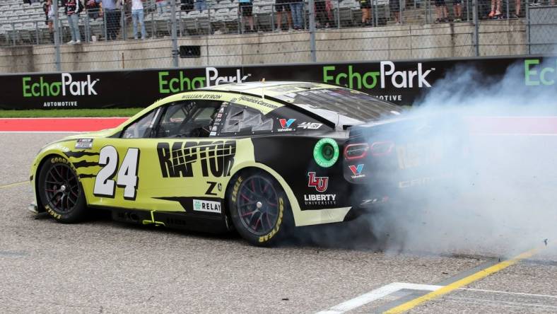 Mar 24, 2024; Austin, Texas, USA;  NASCAR Cup Series driver William Byron (24) performs a burn out after winning the EchoPark Automotive Grand Prix at Circuit of the Americas. Mandatory Credit: Michael C. Johnson-USA TODAY Sports