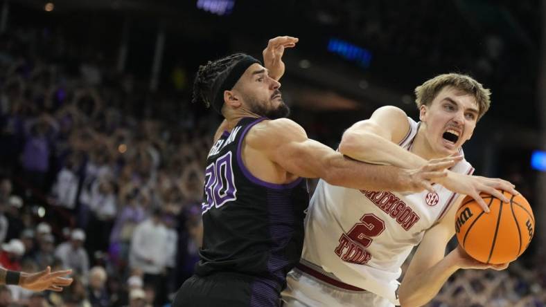 Mar 24, 2024; Spokane, WA, USA; Alabama Crimson Tide forward Grant Nelson (2) plays the ball defined by Grand Canyon Antelopes forward Gabe McGlothan (30) in the second half at Spokane Veterans Memorial Arena. Mandatory Credit: Kirby Lee-USA TODAY Sports