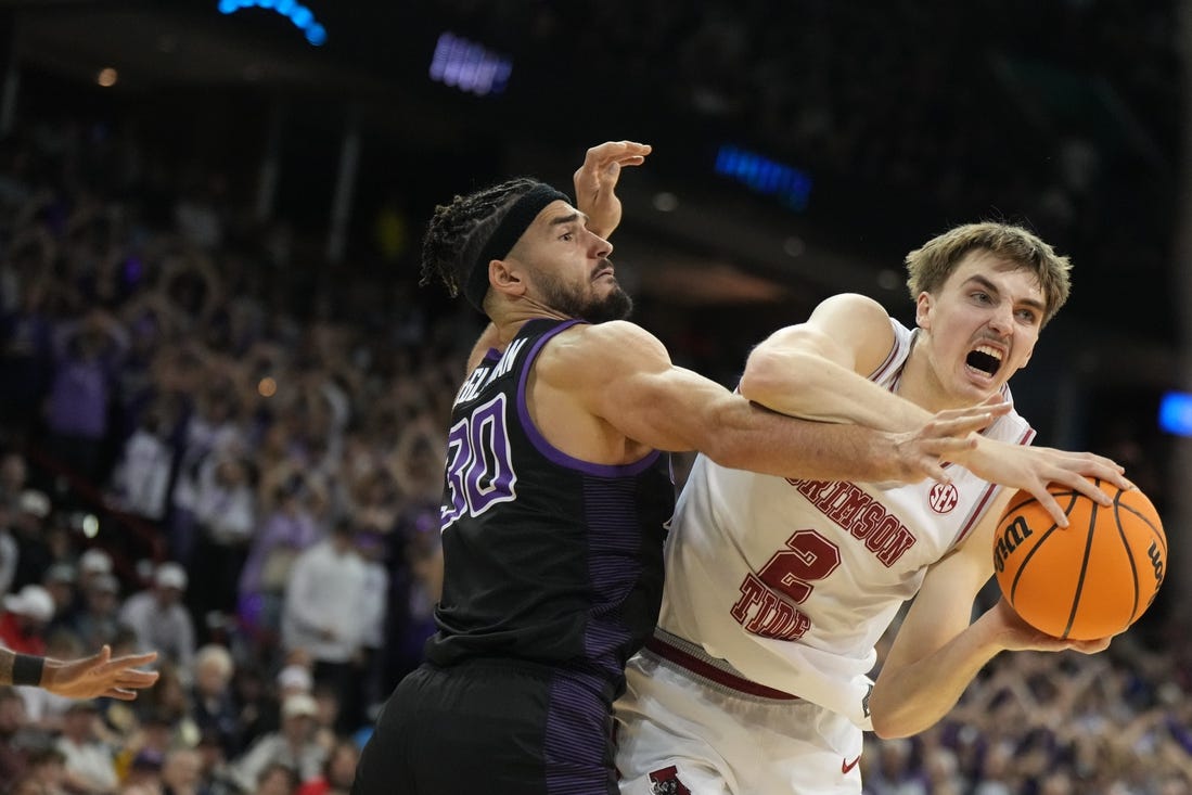 Mar 24, 2024; Spokane, WA, USA; Alabama Crimson Tide forward Grant Nelson (2) plays the ball defined by Grand Canyon Antelopes forward Gabe McGlothan (30) in the second half at Spokane Veterans Memorial Arena. Mandatory Credit: Kirby Lee-USA TODAY Sports