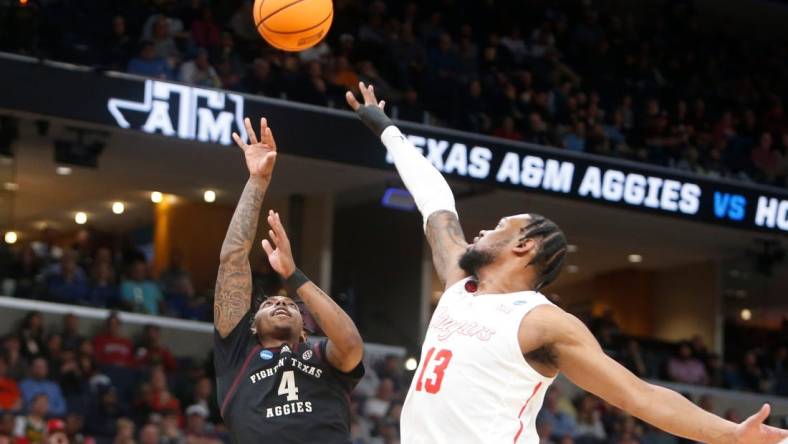 Texas A&M's Wade Taylor IV (4) shoots the ball during the second round game between Texas A&M and the University of Houston in the 2024 NCAA Tournament at FedExForum in Memphis, Tenn., on Sunday, March 24, 2024.