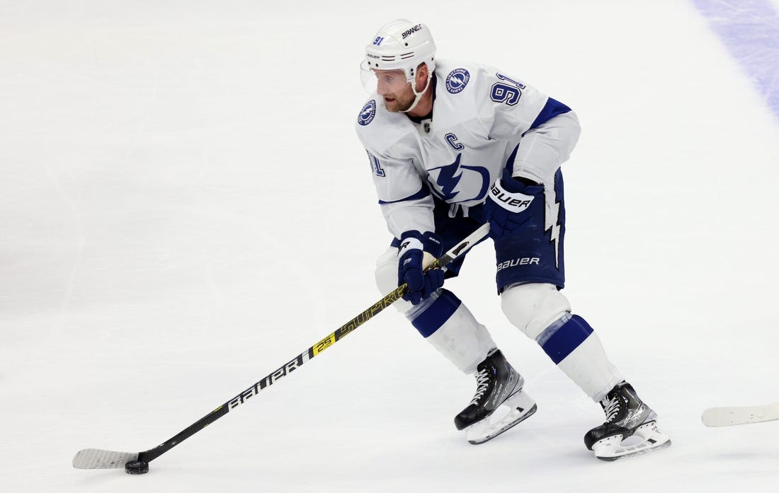 Mar 24, 2024; Anaheim, California, USA; Tampa Bay Lightning center Steven Stamkos (91) skates with the puck during overtime against the Anaheim Ducks at Honda Center. Mandatory Credit: Jason Parkhurst-USA TODAY Sports