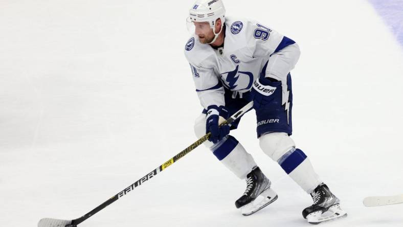 Mar 24, 2024; Anaheim, California, USA; Tampa Bay Lightning center Steven Stamkos (91) skates with the puck during overtime against the Anaheim Ducks at Honda Center. Mandatory Credit: Jason Parkhurst-USA TODAY Sports