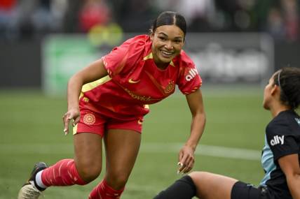 Mar 24, 2024; Portland, Oregon, USA; Portland Thorns FC forward Sophia Smith (9) smiles during the first half against NJ/NY Gotham FC at Providence Park. Mandatory Credit: Troy Wayrynen-USA TODAY Sports