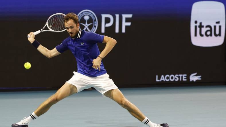 Mar 24, 2024; Miami Gardens, FL, USA; Daniil Medvedev hits a forehand against Cameron Norrie (GBR) (not pictured) on day seven of the Miami Open at Hard Rock Stadium. Mandatory Credit: Geoff Burke-USA TODAY Sports