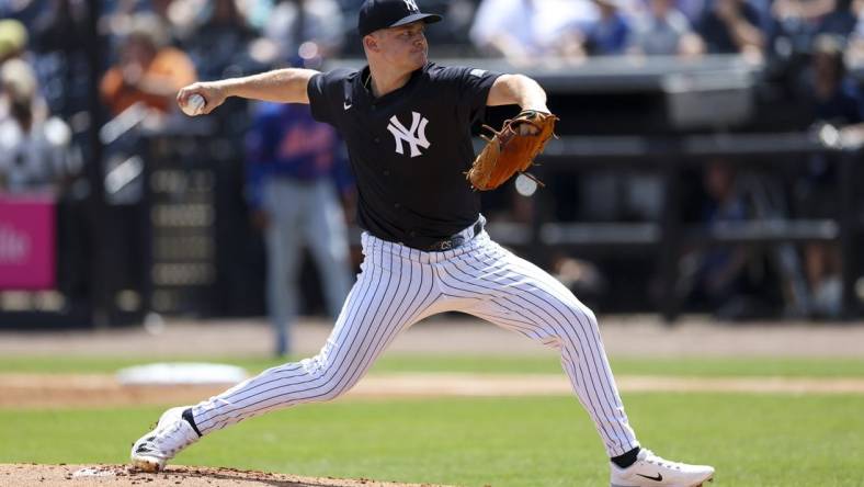 Mar 25, 2024; Tampa, Florida, USA;  New York Yankees starting pitcher Clarke Schmidt (36) throws a pitch against the New York Mets in the first inning at George M. Steinbrenner Field. Mandatory Credit: Nathan Ray Seebeck-USA TODAY Sports