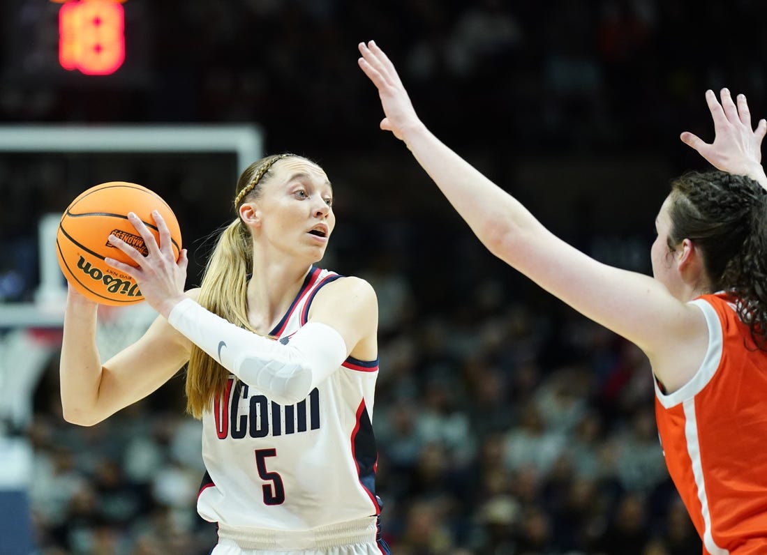 Mar 25, 2024; Storrs, Connecticut, USA; UConn Huskies guard Paige Bueckers (5) looks for an opening against the Syracuse Orange in the first half at Harry A. Gampel Pavilion. Mandatory Credit: David Butler II-USA TODAY Sports