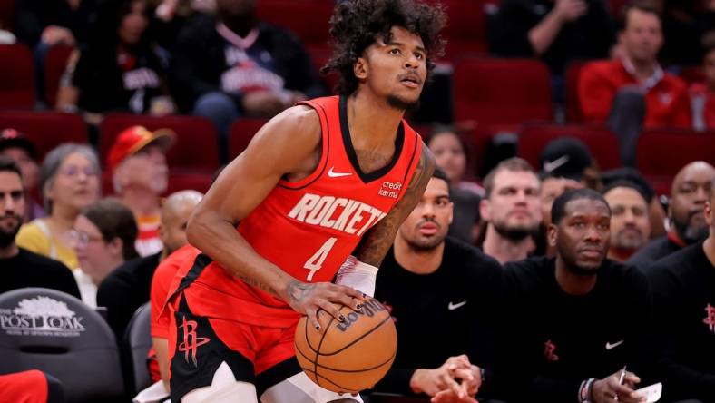 Mar 25, 2024; Houston, Texas, USA; Houston Rockets guard Jalen Green (4) takes a three-point shot against the Portland Trail Blazers during the first quarter at Toyota Center. Mandatory Credit: Erik Williams-USA TODAY Sports