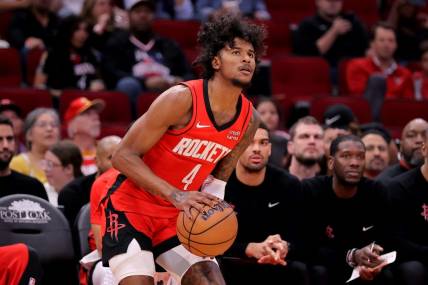 Mar 25, 2024; Houston, Texas, USA; Houston Rockets guard Jalen Green (4) takes a three-point shot against the Portland Trail Blazers during the first quarter at Toyota Center. Mandatory Credit: Erik Williams-USA TODAY Sports