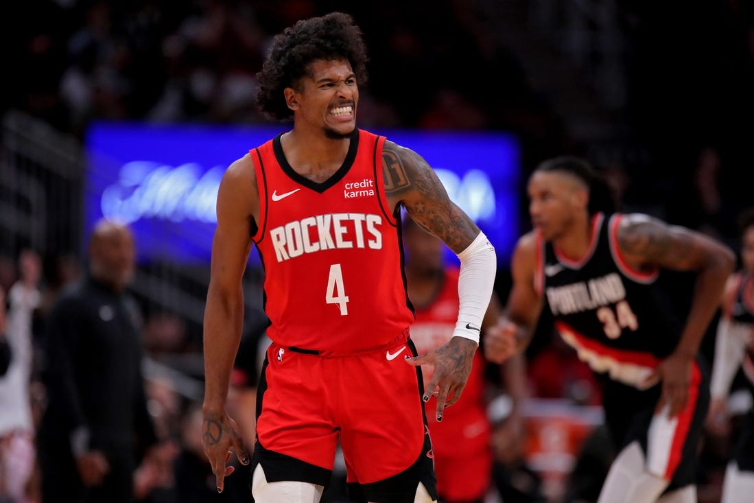 Mar 25, 2024; Houston, Texas, USA; Houston Rockets guard Jalen Green (4) reacts after a basket against the Portland Trail Blazers during the fourth quarter at Toyota Center. Mandatory Credit: Erik Williams-USA TODAY Sports