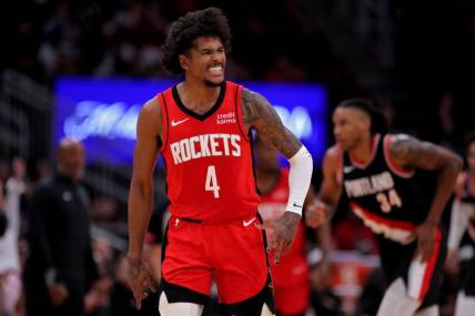 Mar 25, 2024; Houston, Texas, USA; Houston Rockets guard Jalen Green (4) reacts after a basket against the Portland Trail Blazers during the fourth quarter at Toyota Center. Mandatory Credit: Erik Williams-USA TODAY Sports