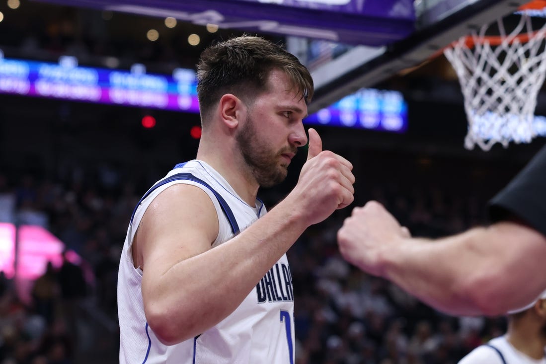 Mar 25, 2024; Salt Lake City, Utah, USA; Dallas Mavericks guard Luka Doncic (77) reacts to a call for the Utah Jazz during the third quarter at Delta Center. Mandatory Credit: Rob Gray-USA TODAY Sports