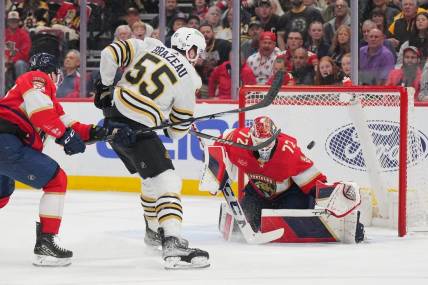 Mar 26, 2024; Sunrise, Florida, USA; Boston Bruins right wing Justin Brazeau (55) takes a shot on goal as Florida Panthers goaltender Sergei Bobrovsky (72) makes a save in the first period at Amerant Bank Arena. Mandatory Credit: Jim Rassol-USA TODAY Sports