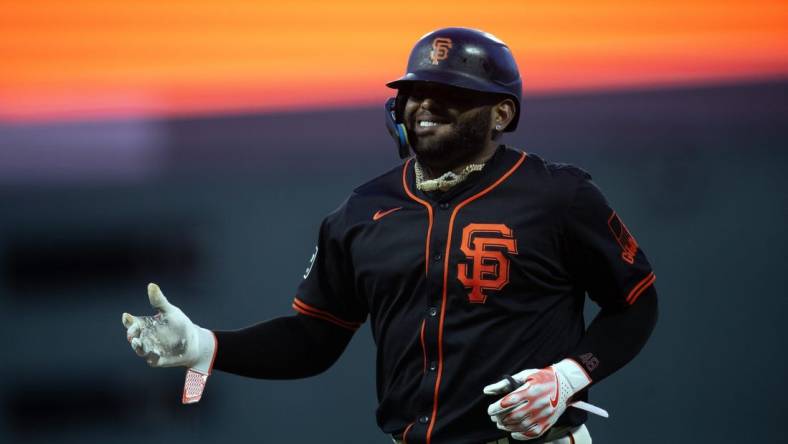 Mar 26, 2024; San Francisco, California, USA; San Francisco Giants third baseman Pablo Sandoval smiles as he is removed for a pinch runner after singling against the Oakland Athletics during the ninth inning at Oracle Park. Mandatory Credit: D. Ross Cameron-USA TODAY Sports