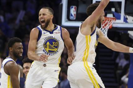 Mar 27, 2024; Orlando, Florida, USA;  Golden State Warriors guard Stephen Curry (30) celebrates with guard Klay Thompson (11) after beating the Orlando Magic at the Kia Center. Mandatory Credit: Nathan Ray Seebeck-USA TODAY Sports