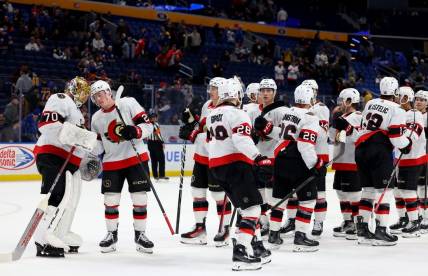 Mar 27, 2024; Buffalo, New York, USA;  The Ottawa Senators celebrate a win over the Buffalo Sabres at KeyBank Center. Mandatory Credit: Timothy T. Ludwig-USA TODAY Sports
