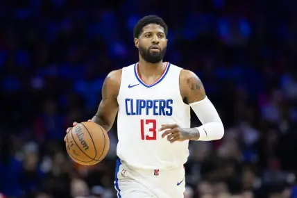 Mar 27, 2024; Philadelphia, Pennsylvania, USA; LA Clippers forward Paul George (13) dribbles the ball against the Philadelphia 76ers during the fourth quarter at Wells Fargo Center. Mandatory Credit: Bill Streicher-USA TODAY Sports