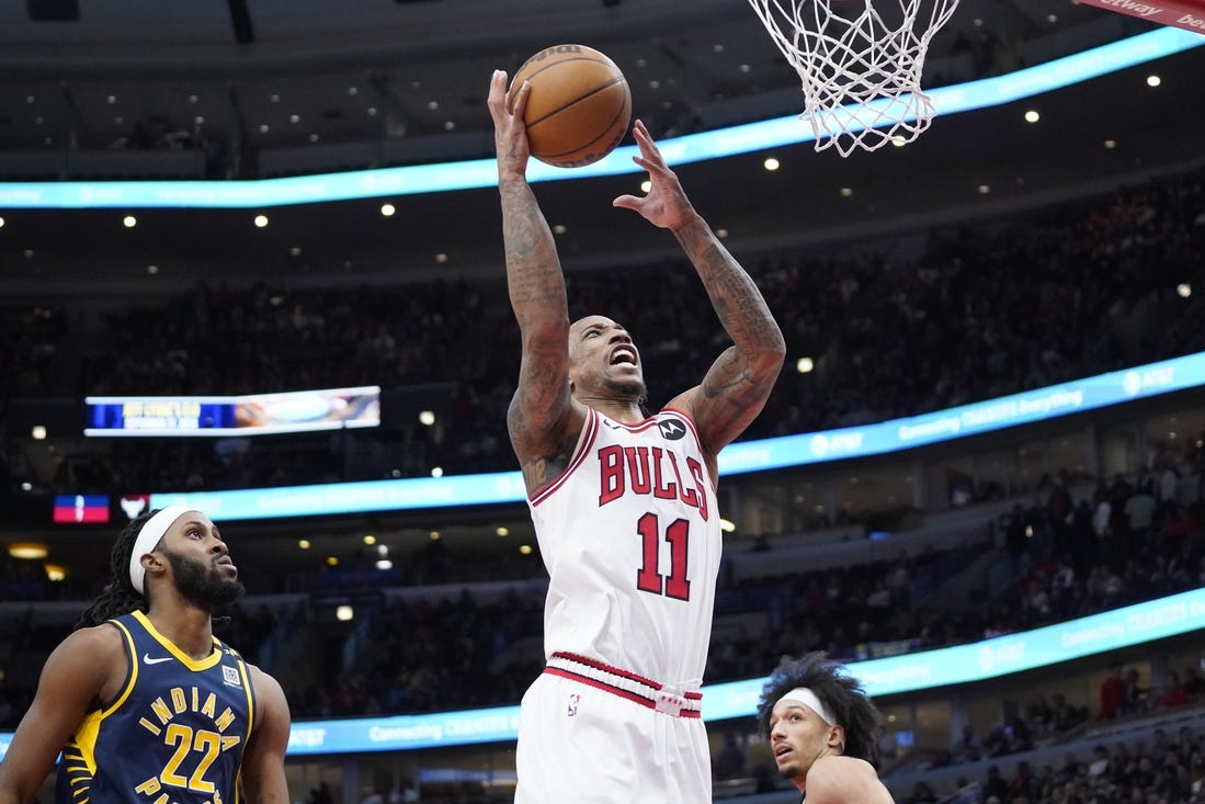 Mar 27, 2024; Chicago, Illinois, USA; Chicago Bulls forward DeMar DeRozan (11) is defended by Indiana Pacers forward Isaiah Jackson (22) during the second half at United Center. Mandatory Credit: David Banks-USA TODAY Sports